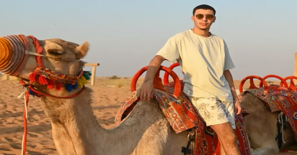 Desert safari Dubai with Khorfakkan tour showing sand dunes, mountains and coastline